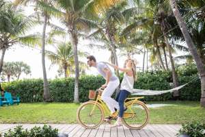Man and Woman on a yellow bicycle