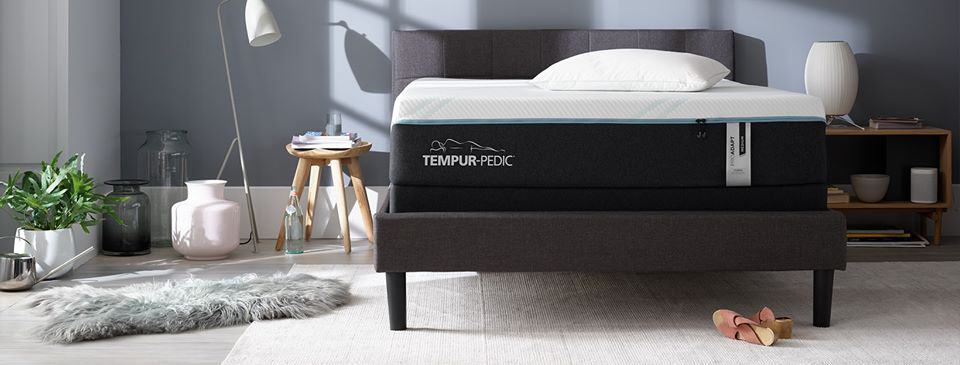 Tempur-pedic mattress on a bed frame