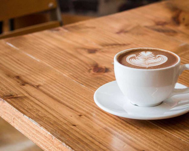 Cup of Coffee with Leaf Pattern